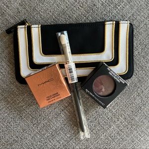 M•A•C 217 Brush, makeup case and 2 full size eye shadows.